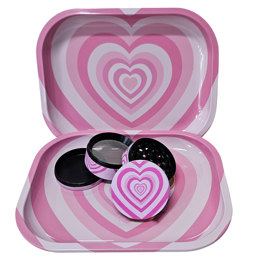 Pink concentric-heart rolling tray and matching grinder shown with its sections apart