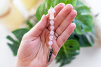 Pink mushroom beaded wand cigarette holder shown in hand