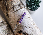 Silver-tone purple beaded wand cigarette holder close-up