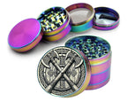 Crossed Viking axes and shield design on rainbow herb grinder with open product view