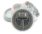 Norse hammer and knotwork design on pearl white herb grinder with open product view