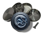 Oceanic ouroboros rune circle design on grey herb grinder with open product view