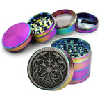 Intertwined runic serpents design on rainbow herb grinder with open product view