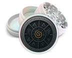 Elemental spiral and wing sigil design on pearl white herb grinder with open product view