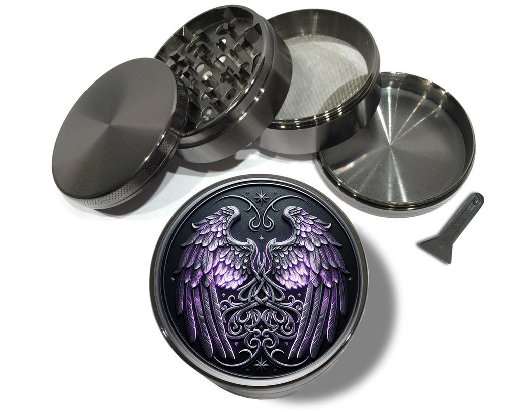 Celestial wings and knotwork crest design on grey herb grinder with open product view
