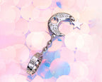 Silver-tone crescent moon cigarette holder ring close-up