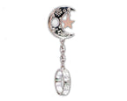 Silver-tone crescent moon cigarette holder ring on a white background