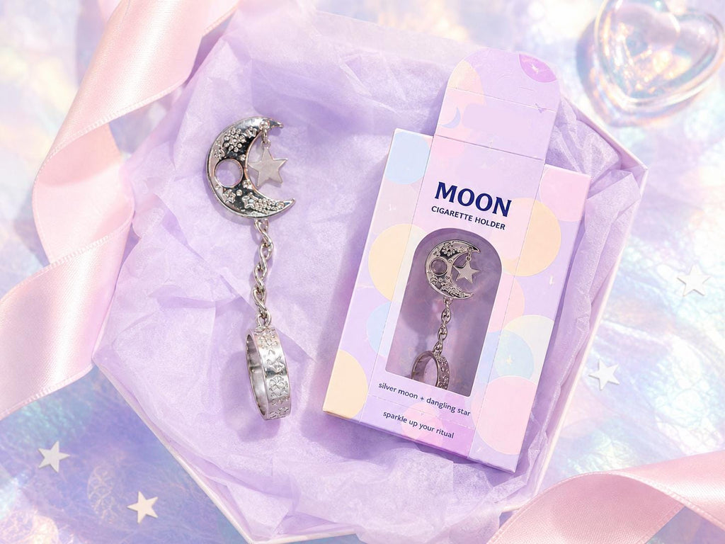 Silver-tone crescent moon cigarette holder ring with packaging
