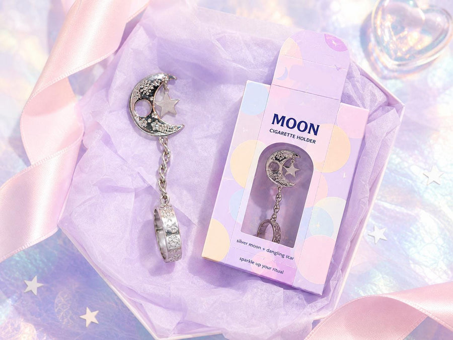Silver-tone crescent moon cigarette holder ring with packaging