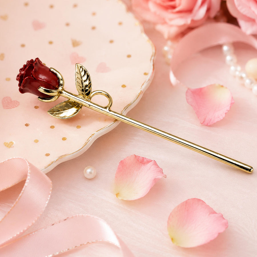 Gold-tone rose cigarette holder with red rose decoration
