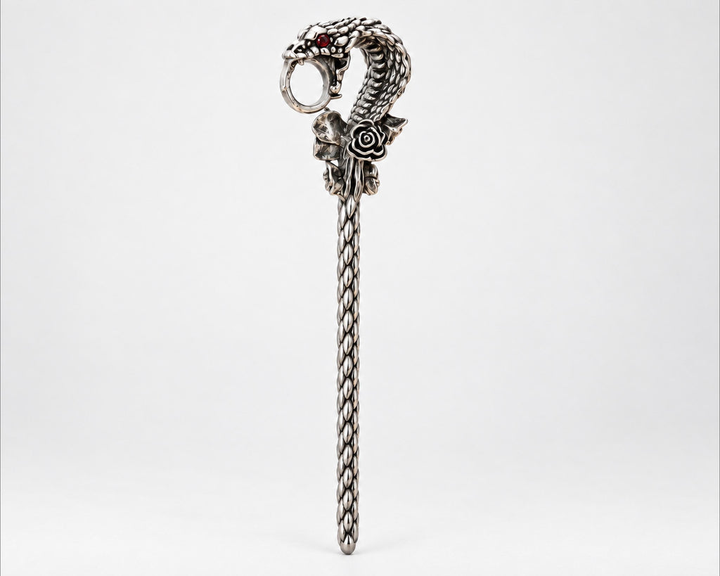 Full-length silver-tone snake cigarette holder on white