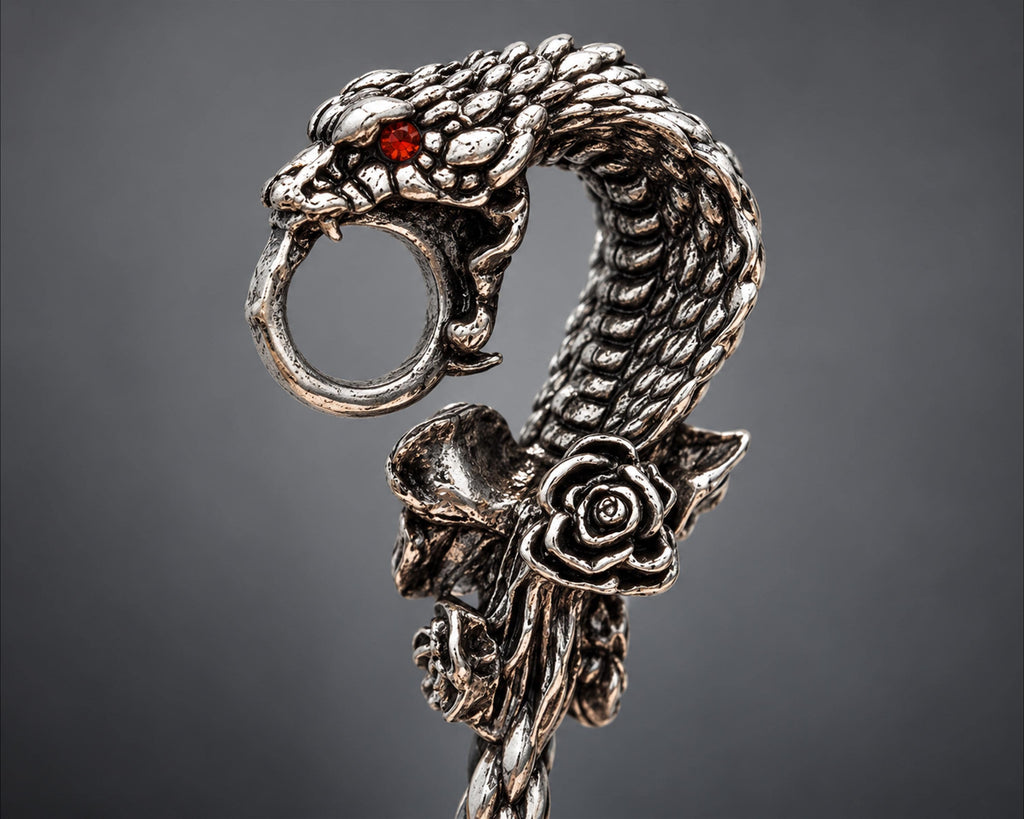Red-eye silver-tone snake cigarette holder close-up