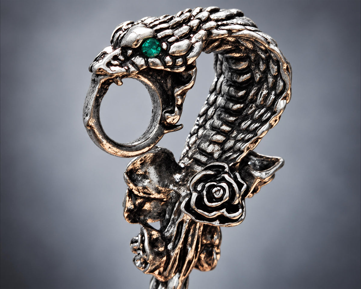 Green-eye silver-tone snake cigarette holder close-up