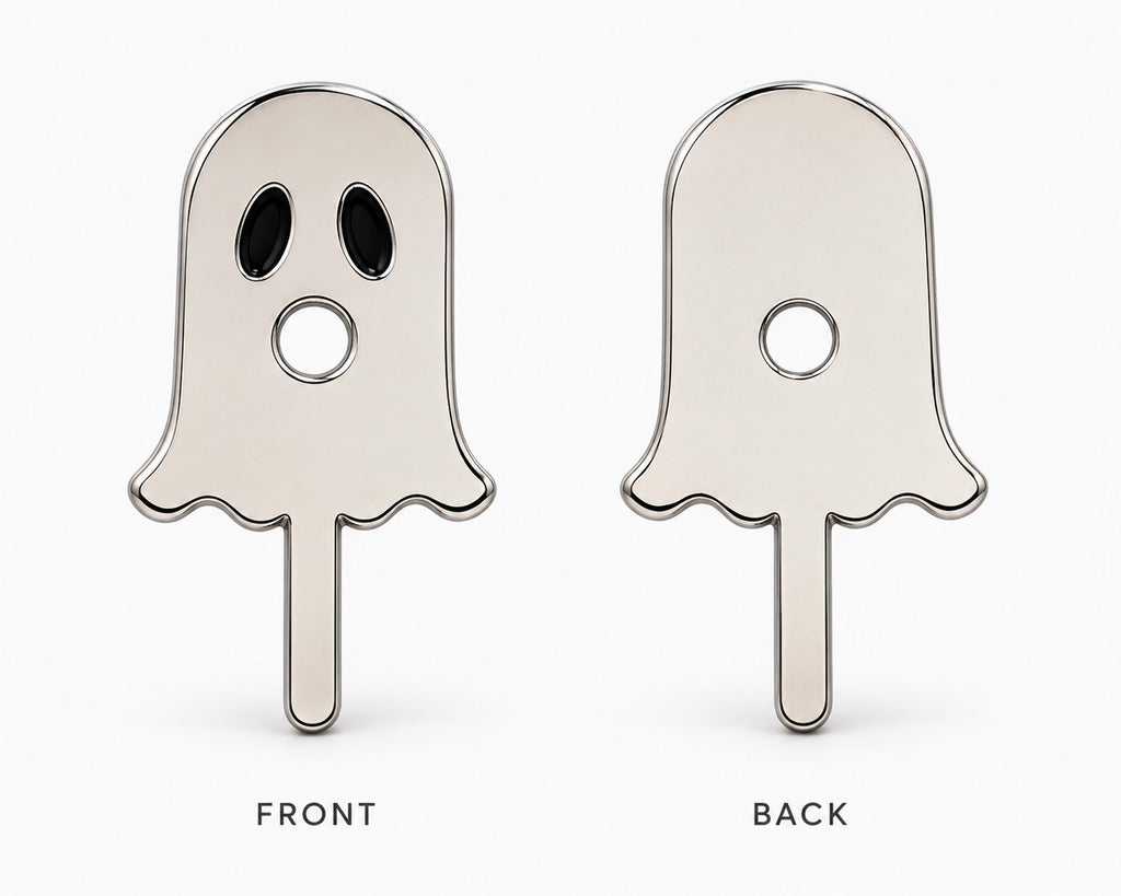 Front and back views of silver-tone ghost cigarette holder