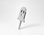 Angled view of silver-tone ghost cigarette holder