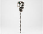 Silver-tone snake cigarette holder side view on white